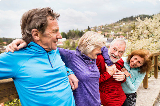 Happy older couples wearing workout gear