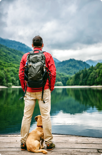 Man and his dog at the lake