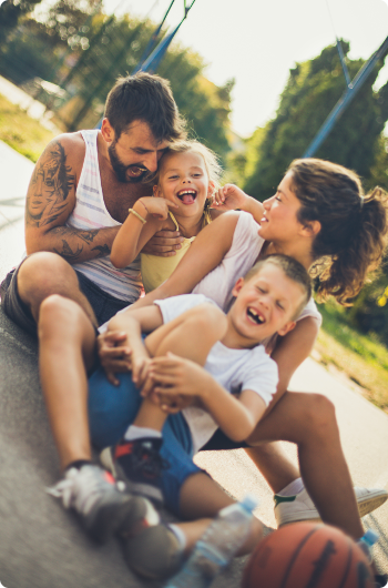 Family playing basketball