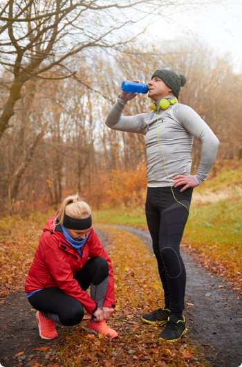 Couple preparing to run in the fall